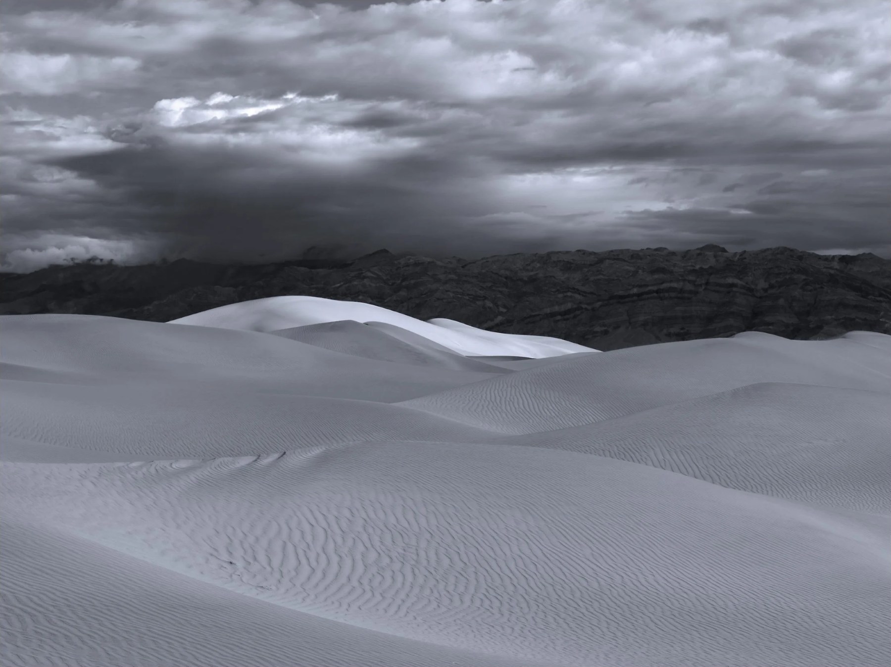 Figure on a dune at sunrise — Paul Rice
